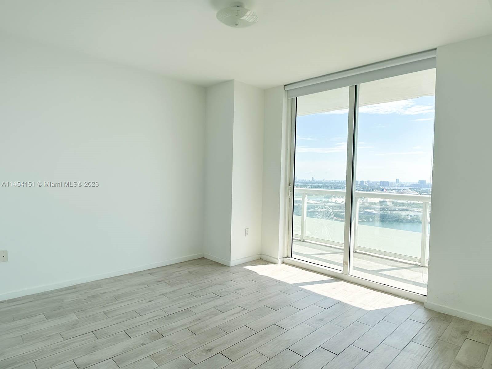 50 Biscayne Boulevard, Unit 3104 Miami, FL 33132 - Photo 27 of 52 a view of an empty room and window