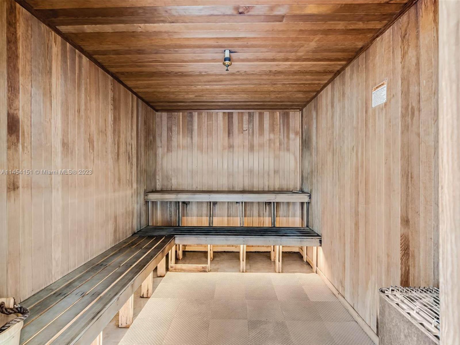 50 Biscayne Boulevard, Unit 3104 Miami, FL 33132 - Photo 44 of 52 a living room with a furniture a rug and a window