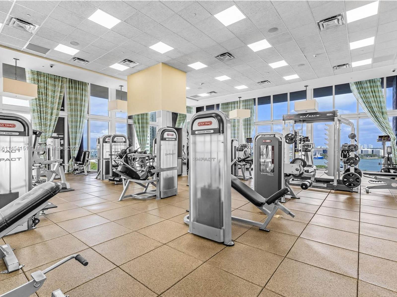 50 Biscayne Boulevard, Unit 3104 Miami, FL 33132 - Photo 46 of 52 a view of a room with gym equipment