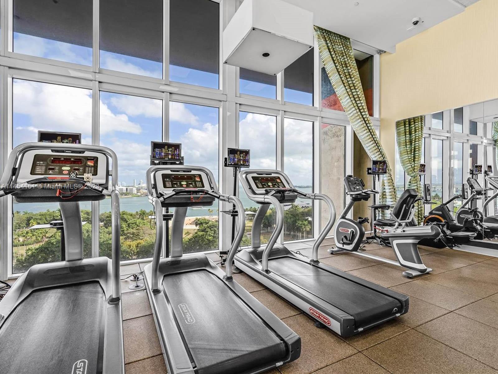 50 Biscayne Boulevard, Unit 3104 Miami, FL 33132 - Photo 47 of 52 a view of a room with gym equipment