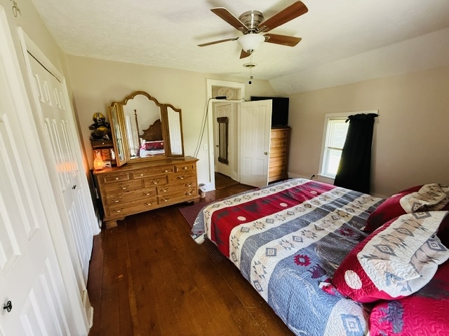 22503 2800th Road North Odell, IL 60460 - Photo 22 of 30 a bedroom with a bed a dresser and flat screen tv