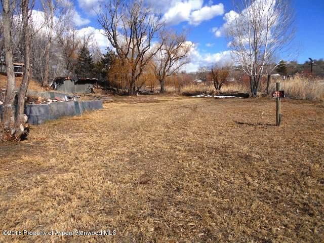 805 Randolph Avenue Rifle, CO 81650 - Photo 3 of 20 a view of yard covered with snow