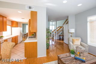 697 Lariate Lane, Unit A Simi Valley, CA 93065 - Photo 7 of 17 a living room with furniture and a wooden floor