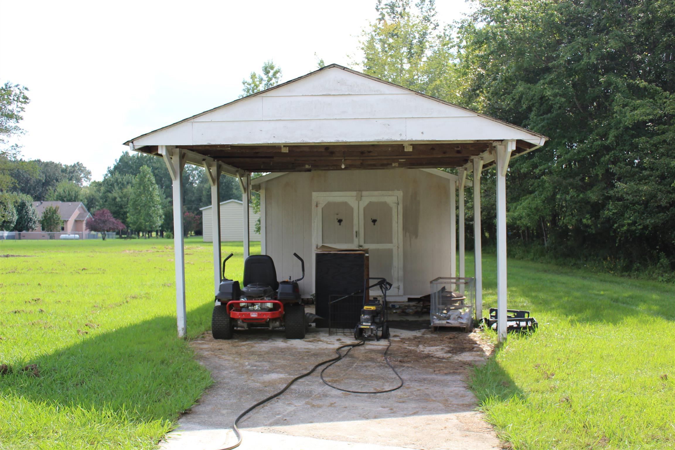 2676 Wayside Road Manchester, TN 37355 - Photo 15 of 16 a front view of a house with garden