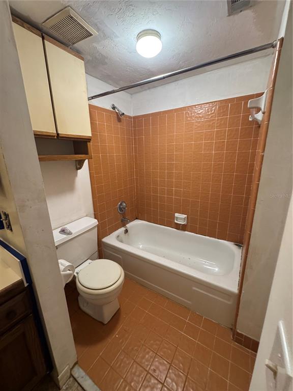 1515 Northwest 29 Road, Unit E3 Gainesville, FL 32605 - Photo 11 of 16 a bathroom with a sink and a toilet