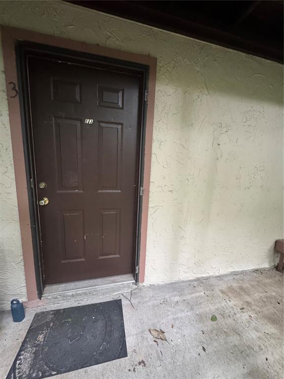 1515 Northwest 29 Road, Unit E3 Gainesville, FL 32605 - Photo 3 of 15 a view of door