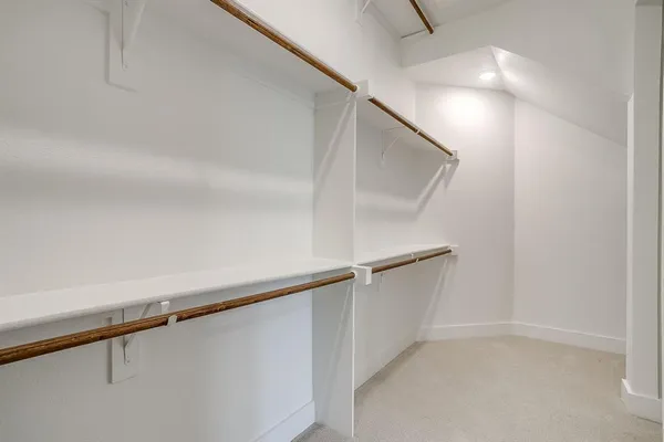 a view of an empty walk in closet