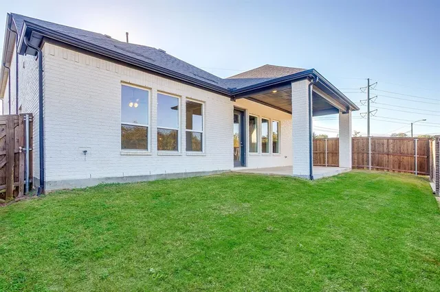 a house view with a garden space