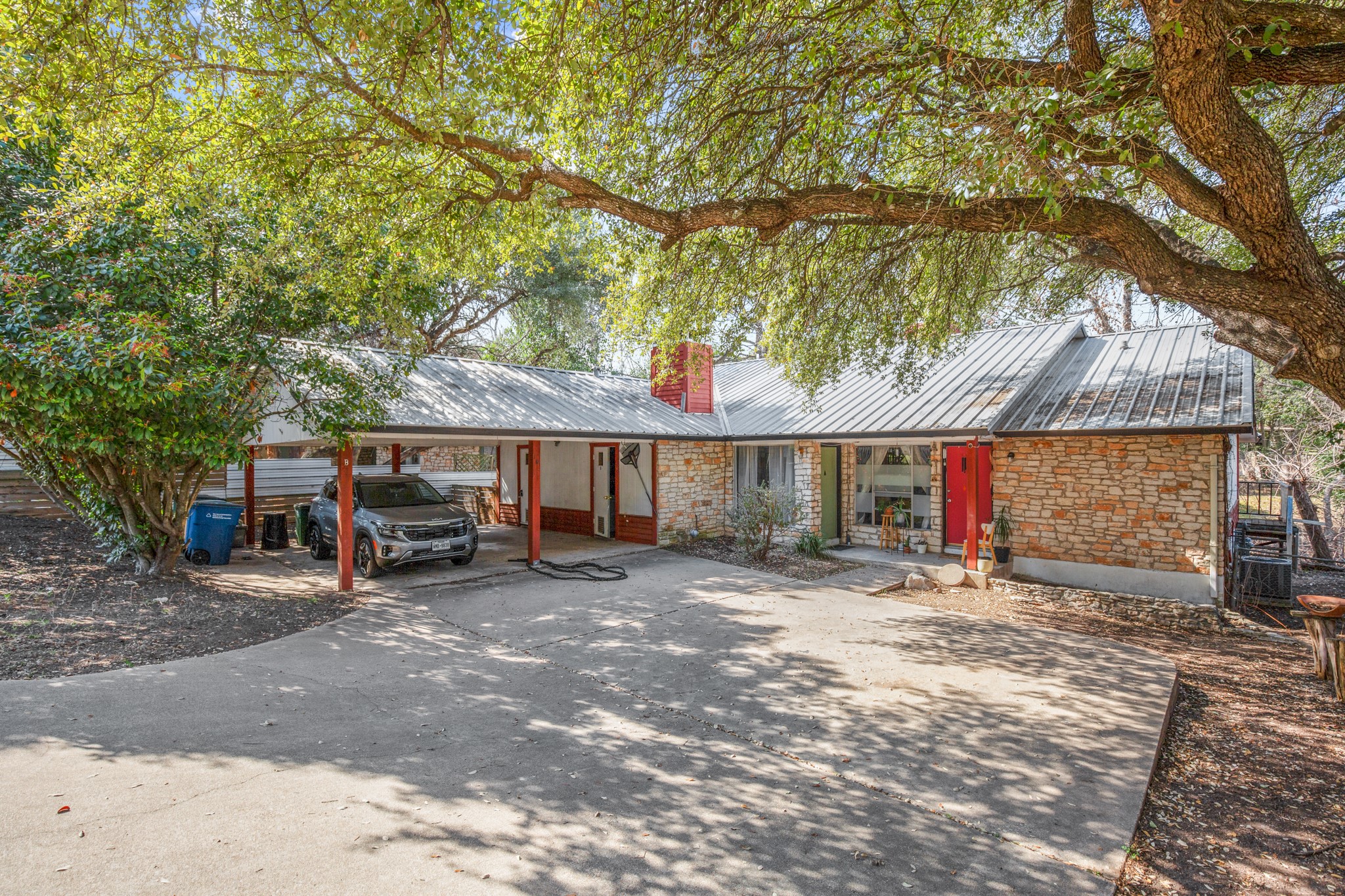 5402 Brompton Circle Austin, TX 78745 - Photo 7 of 30 A private driveway offers additional off-street parking for residents and guests.
