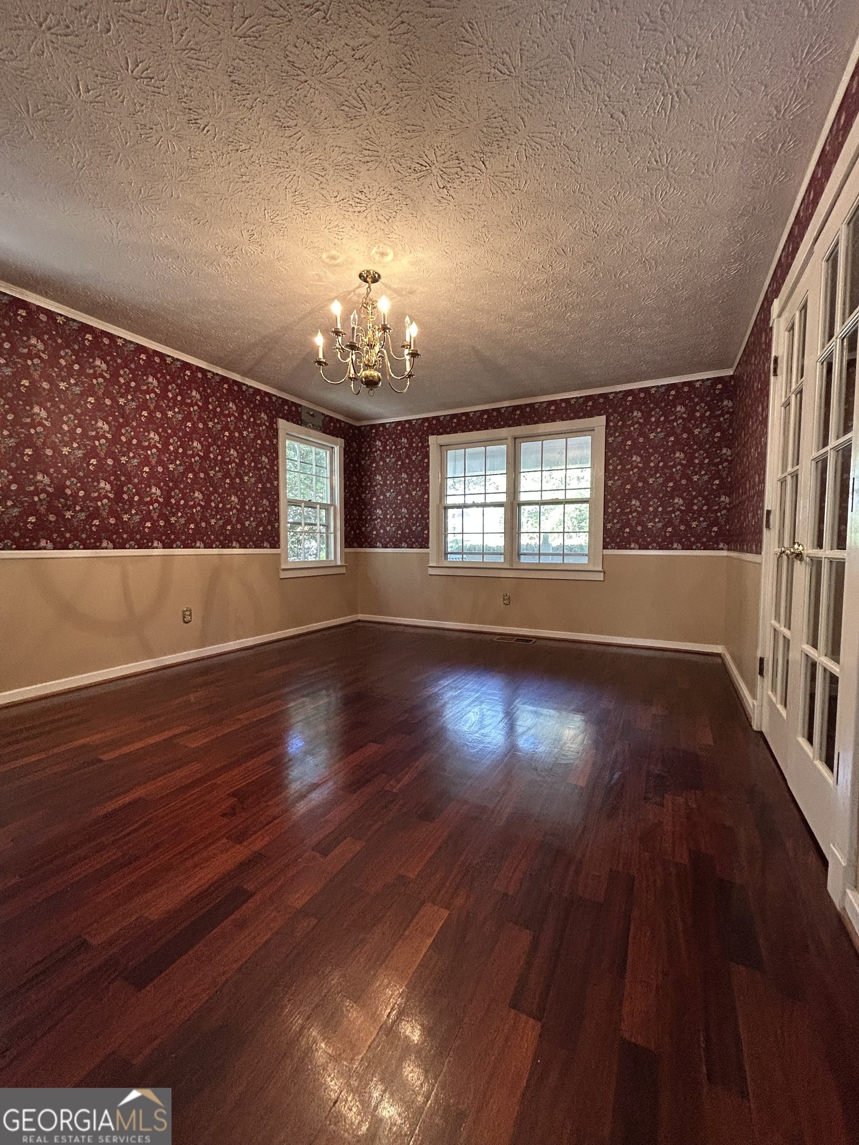 104 Spring Valley Drive LaGrange, GA 30240 - Photo 20 of 55 an empty room with wooden floor and window