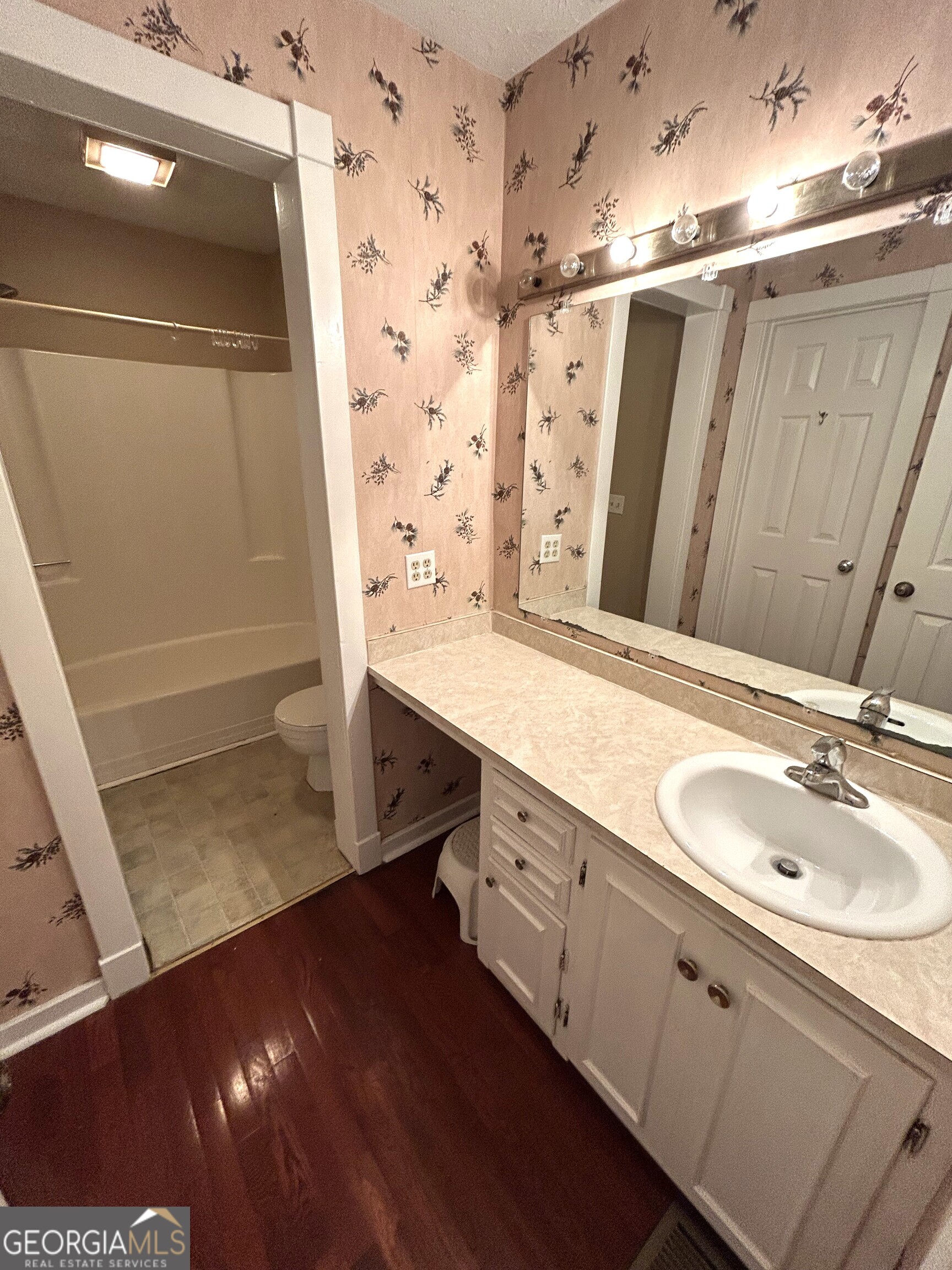 104 Spring Valley Drive LaGrange, GA 30240 - Photo 29 of 55 a bathroom with a sink and a mirror