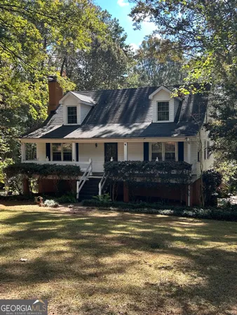 a view of a house with a swimming pool