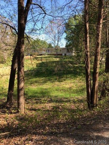 4112 Tater Ridge Road Concord, NC 28025 - Photo 1 of 4 a view of a trees in a yard