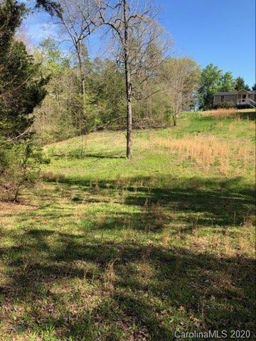 4112 Tater Ridge Road Concord, NC 28025 - Photo 3 of 4 a view of a lake with a yard
