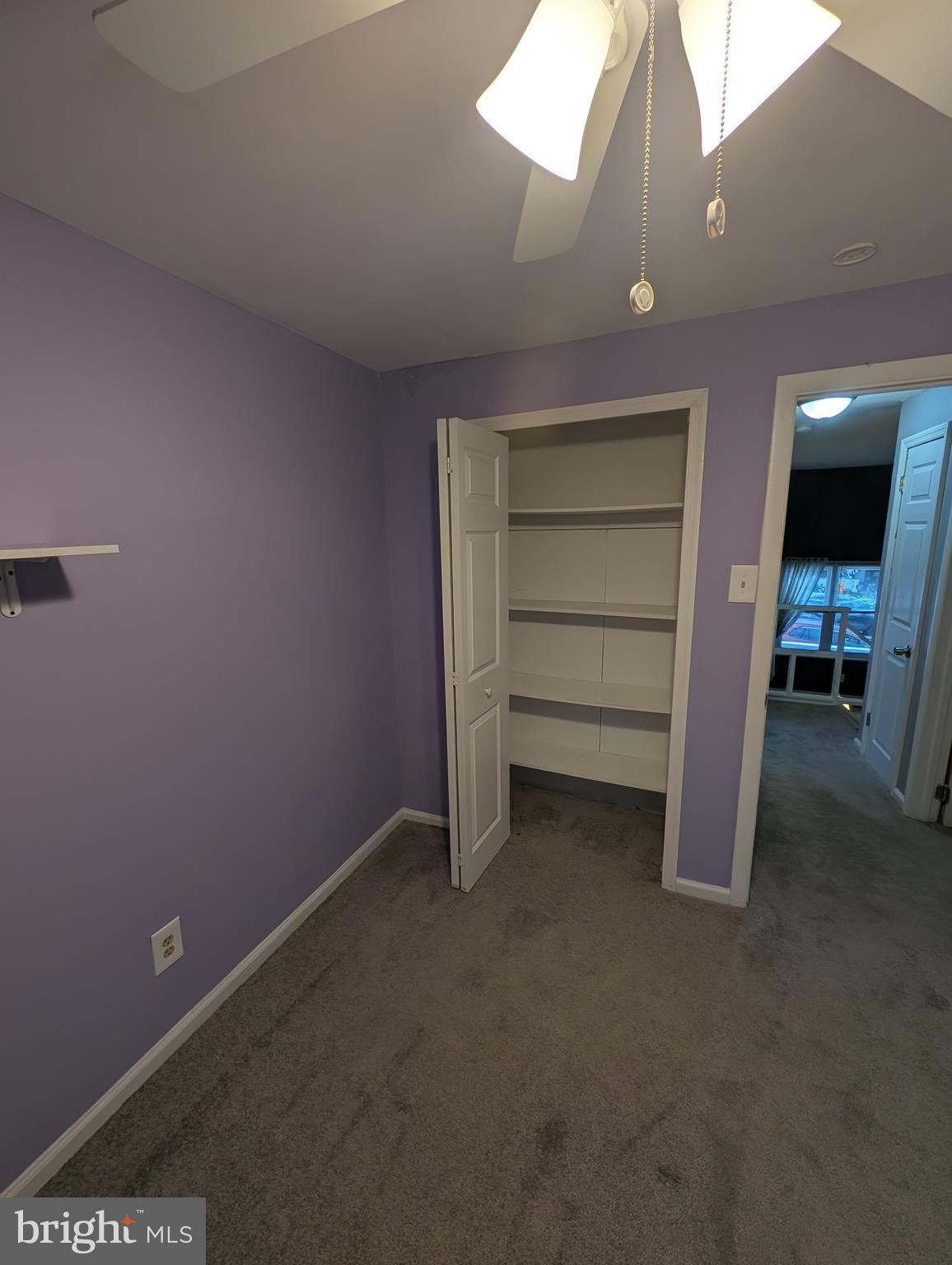 1412 Simpson Street Marcus Hook, PA 19061 - Photo 12 of 35 a view of an empty room with a fireplace