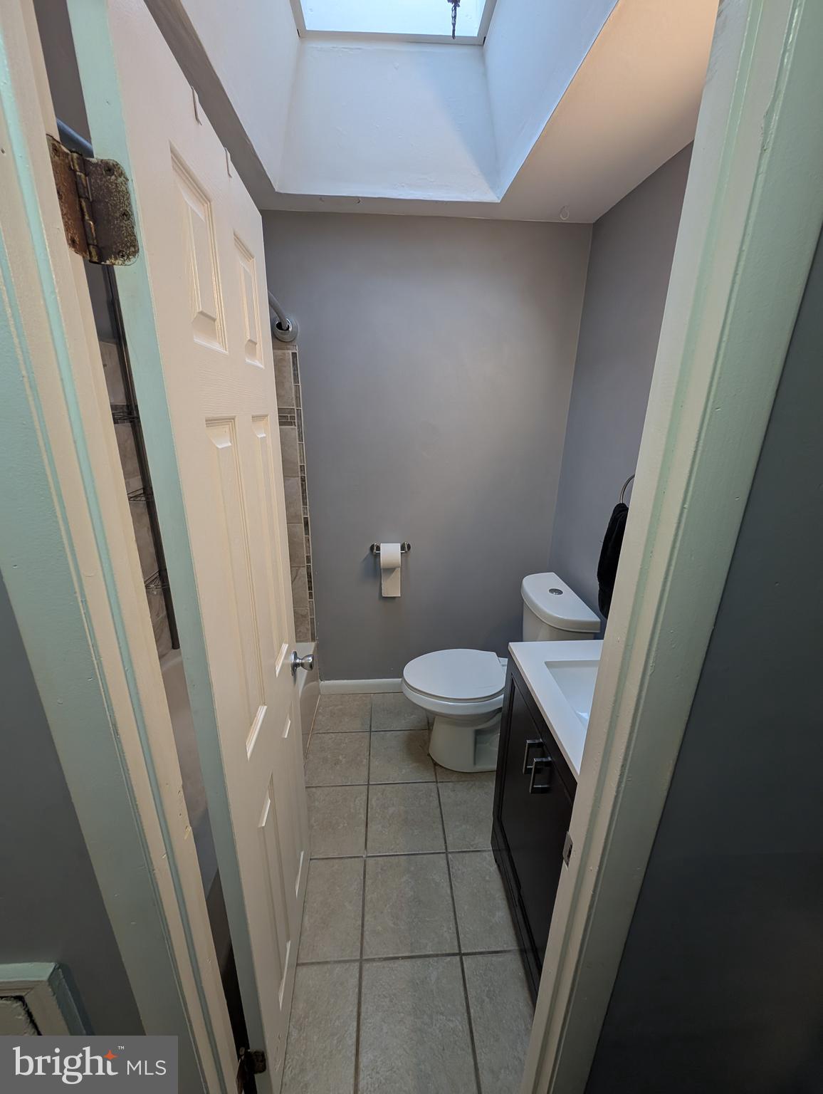 1412 Simpson Street Marcus Hook, PA 19061 - Photo 15 of 35 a bathroom with a toilet and a shower