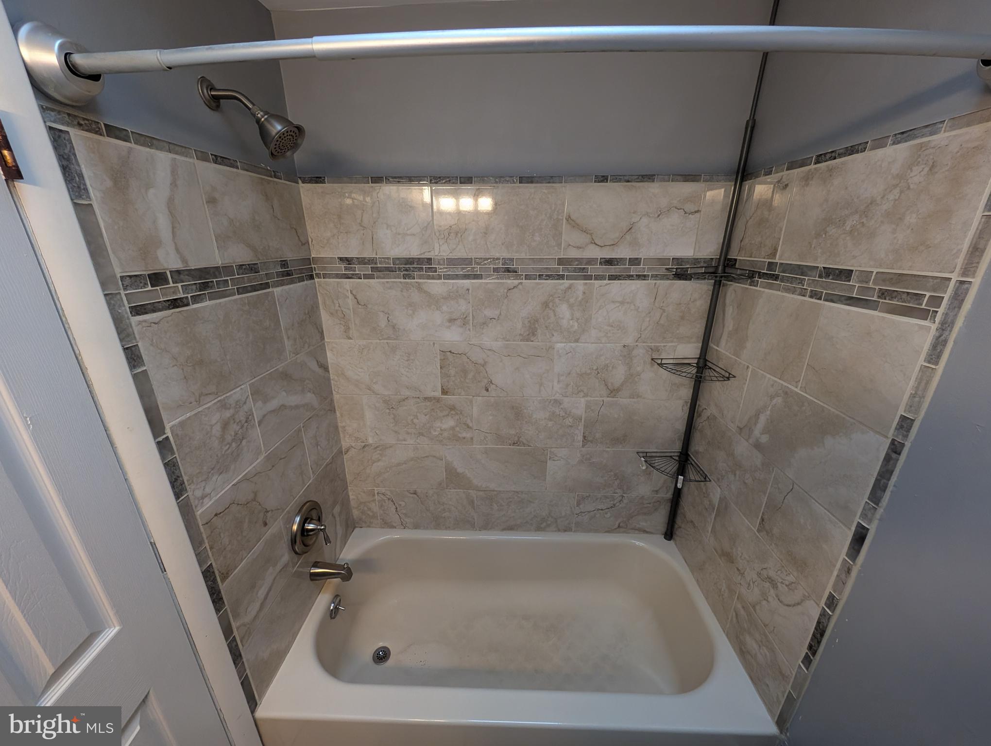 1412 Simpson Street Marcus Hook, PA 19061 - Photo 16 of 35 a close view of a bathtub in bathroom