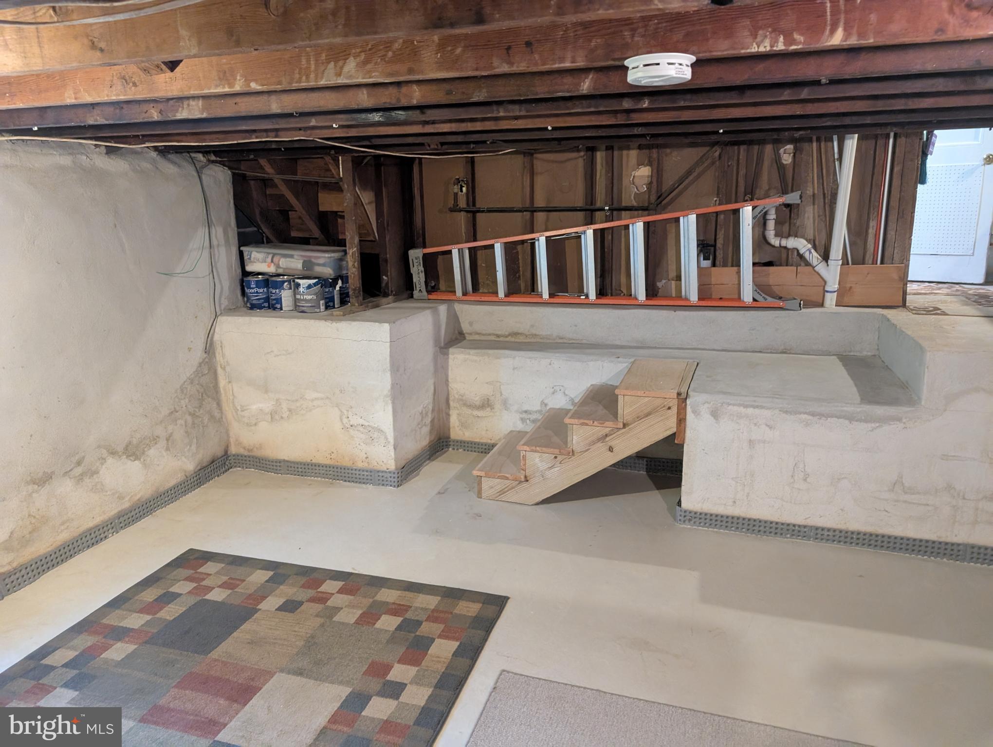 1412 Simpson Street Marcus Hook, PA 19061 - Photo 31 of 35 a living room with furniture and a rug