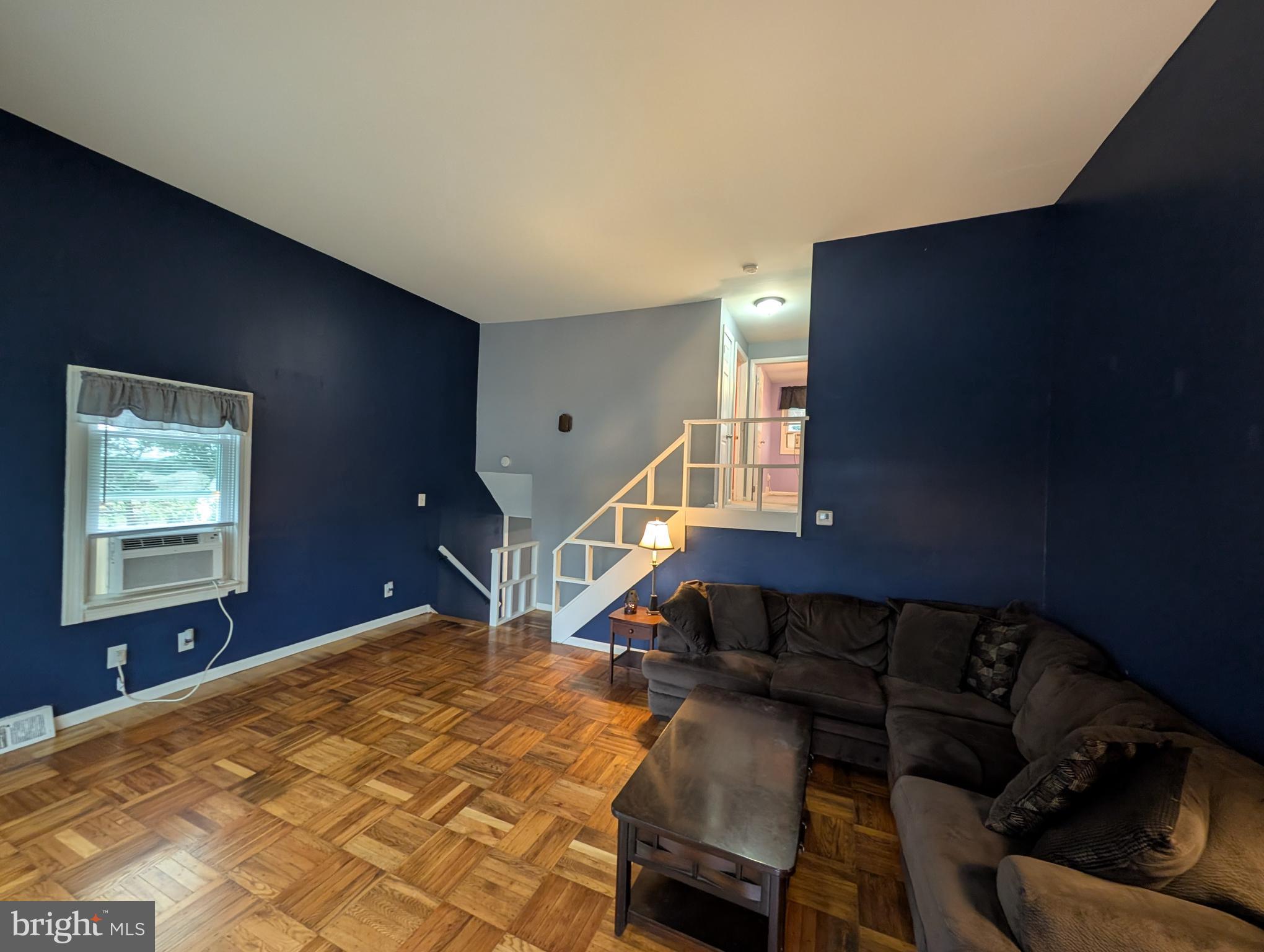 1412 Simpson Street Marcus Hook, PA 19061 - Photo 5 of 35 a bedroom with furniture and a window