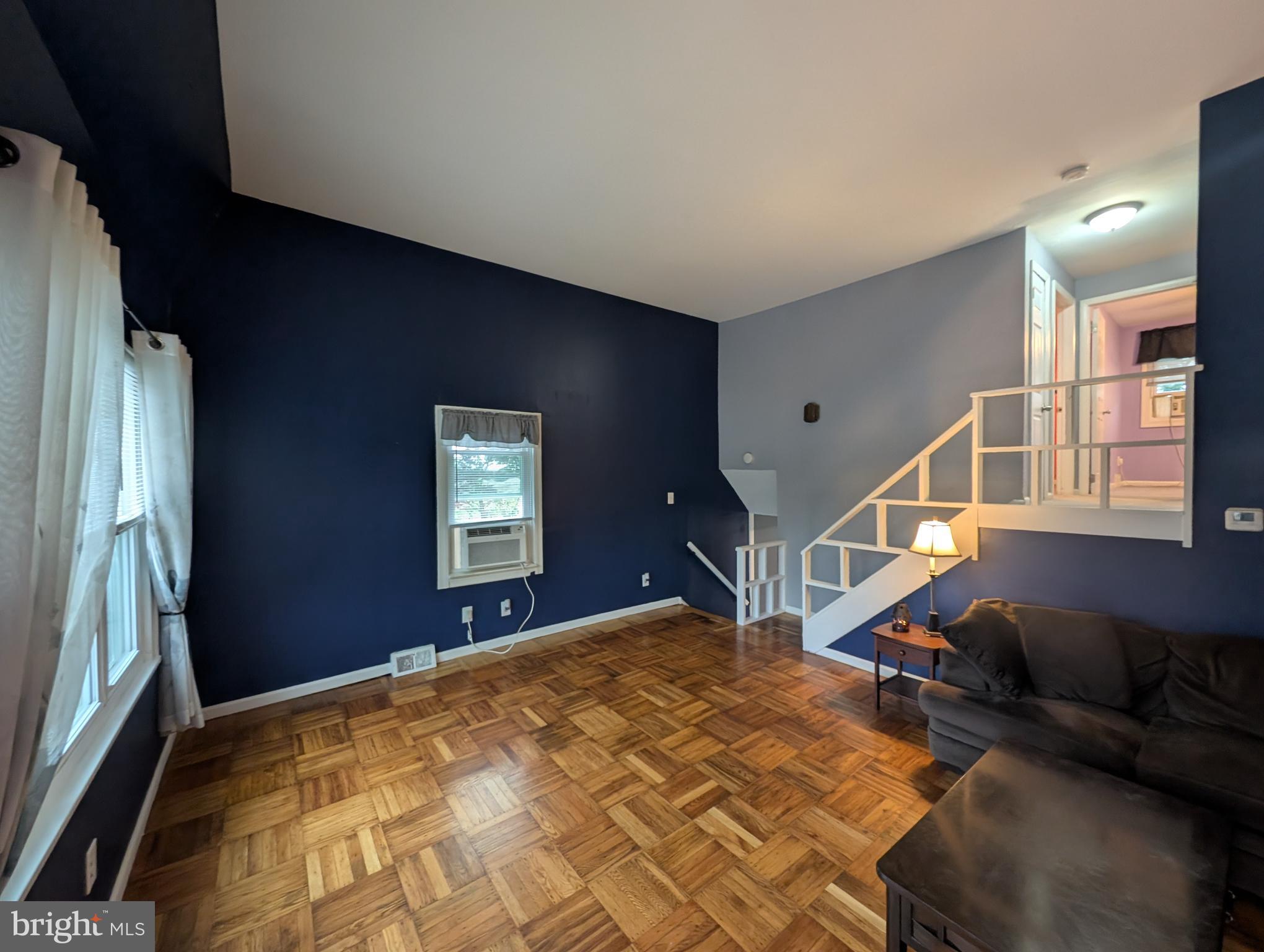 1412 Simpson Street Marcus Hook, PA 19061 - Photo 8 of 35 a bedroom with bed and wooden floor