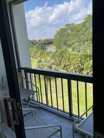 2500 Presidential Way, Unit 405 West Palm Beach, FL 33401 - Photo 7 of 28 a view of stairs