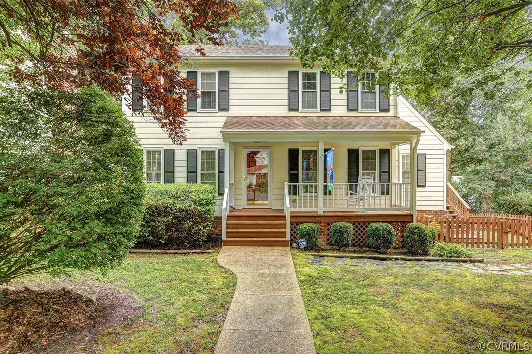 863 Watch Hill Road Midlothian, VA 23114 - Photo 1 of 38 a front view of a house with a yard