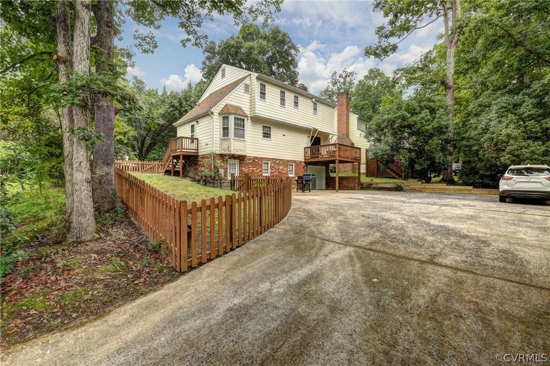 863 Watch Hill Road Midlothian, VA 23114 - Photo 20 of 38 a view of a house with wooden fence