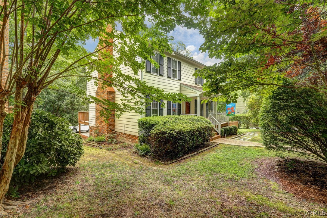 863 Watch Hill Road Midlothian, VA 23114 - Photo 22 of 38 a front view of a house with a yard