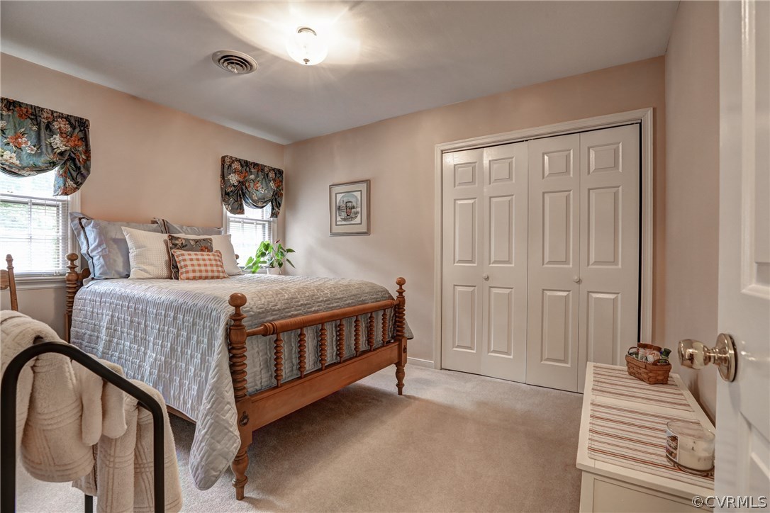 863 Watch Hill Road Midlothian, VA 23114 - Photo 25 of 38 a bedroom with a bed next to a window
