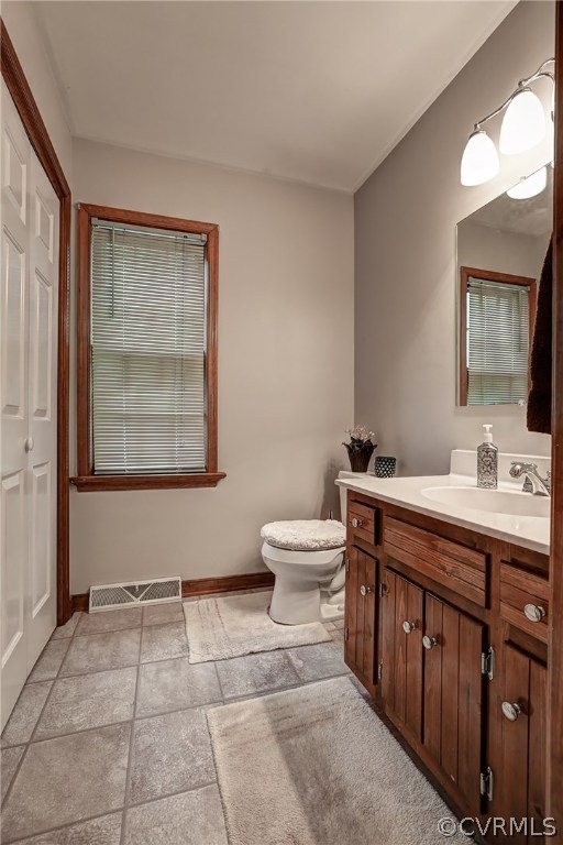 863 Watch Hill Road Midlothian, VA 23114 - Photo 35 of 38 a bathroom with a toilet sink and mirror