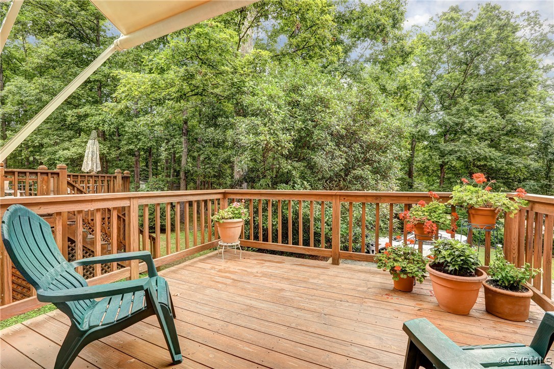 863 Watch Hill Road Midlothian, VA 23114 - Photo 36 of 38 a view of a chair and table on the wooden deck