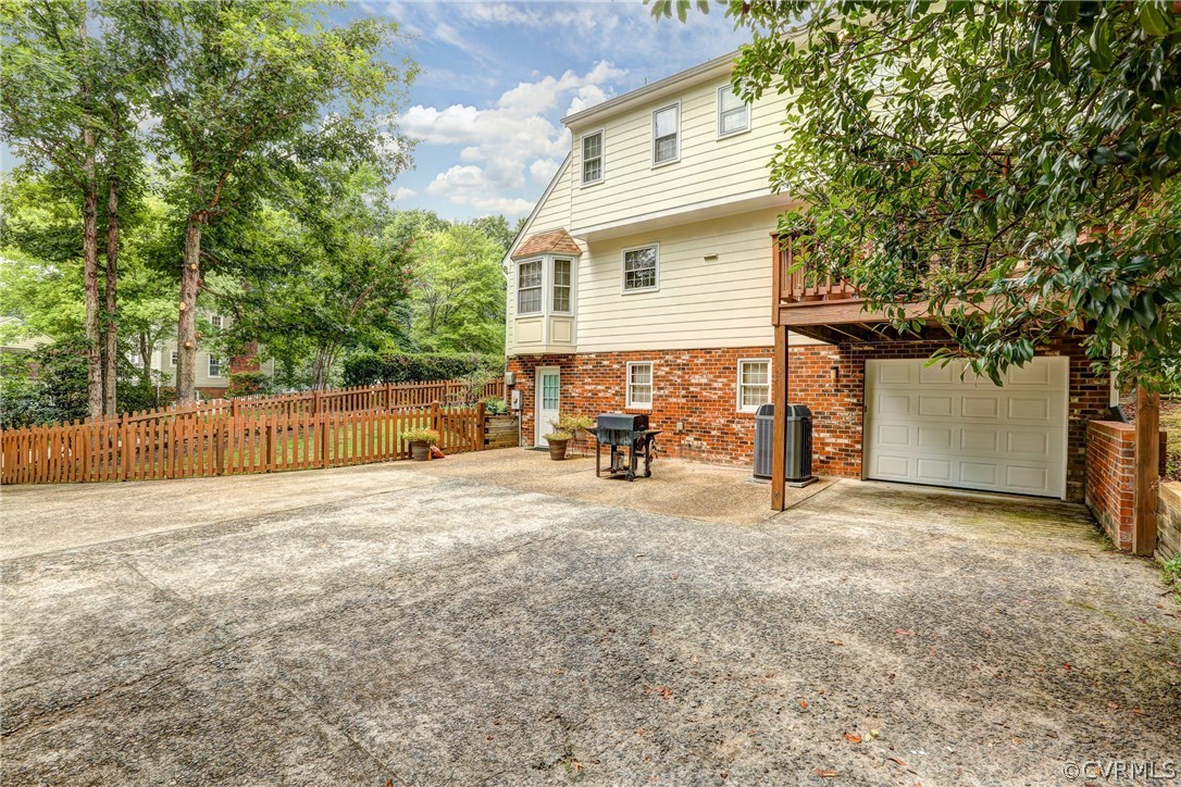 863 Watch Hill Road Midlothian, VA 23114 - Photo 38 of 38 a view of a house with backyard and trees
