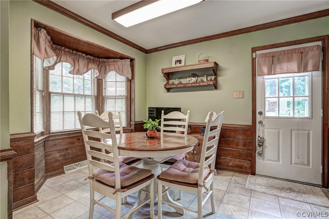 863 Watch Hill Road Midlothian, VA 23114 - Photo 10 of 38 a view of a dining room with furniture window and outside view
