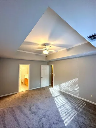 a view of an empty room and window