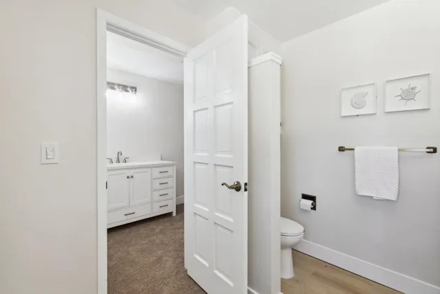 a white bath tub sitting next to a window