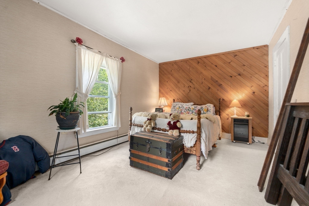 130 Tower Road Lincoln, MA 01773 - Photo 15 of 21 a bedroom with furniture and a window