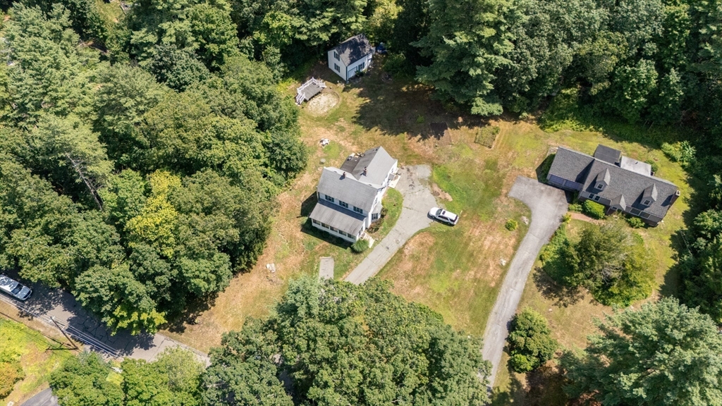 130 Tower Road Lincoln, MA 01773 - Photo 20 of 21 an aerial view of house with yard swimming pool and outdoor seating