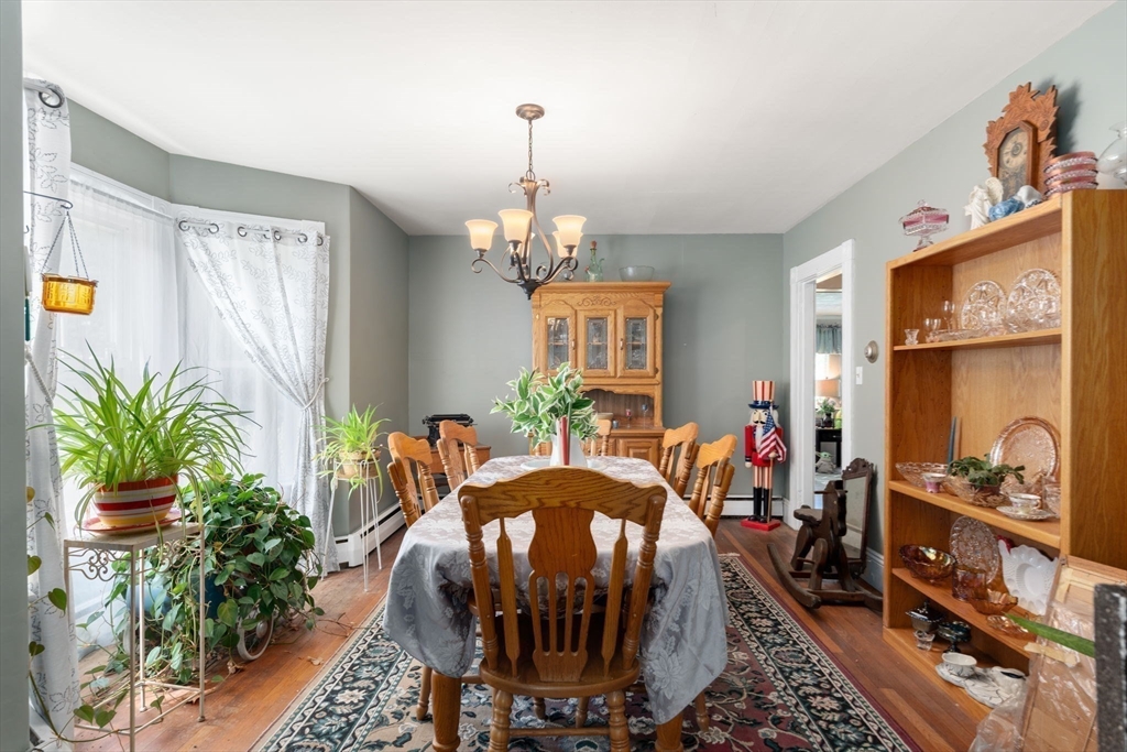 130 Tower Road Lincoln, MA 01773 - Photo 3 of 21 a living room filled with furniture and a chandelier