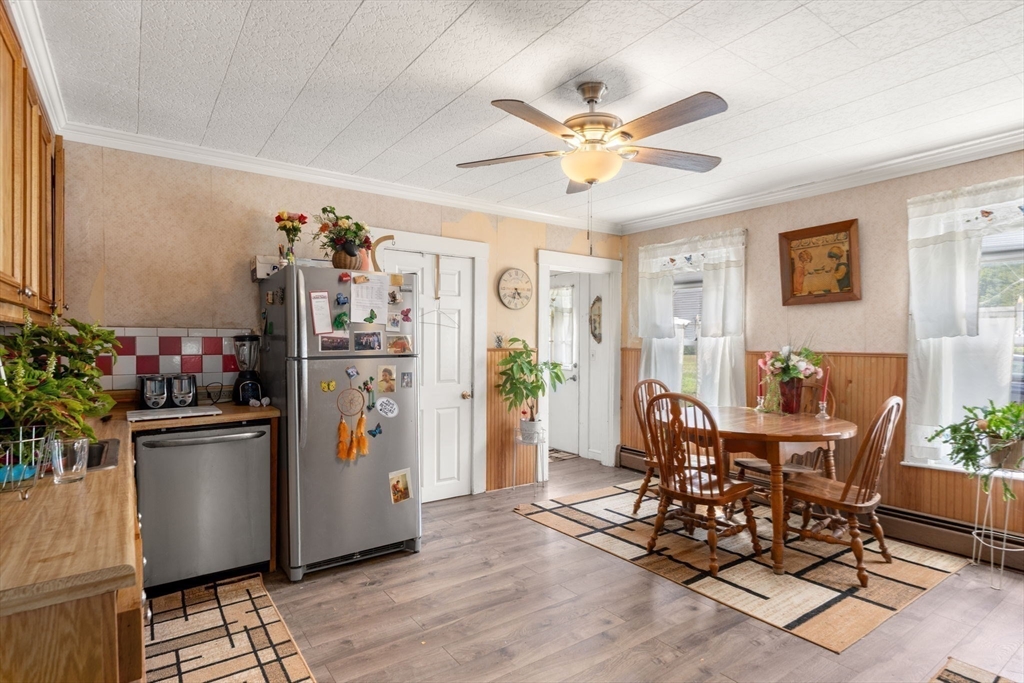 130 Tower Road Lincoln, MA 01773 - Photo 4 of 21 a view of a dining room with furniture and a window