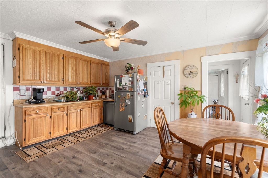 130 Tower Road Lincoln, MA 01773 - Photo 5 of 21 a view of a dining room with furniture and chandelier