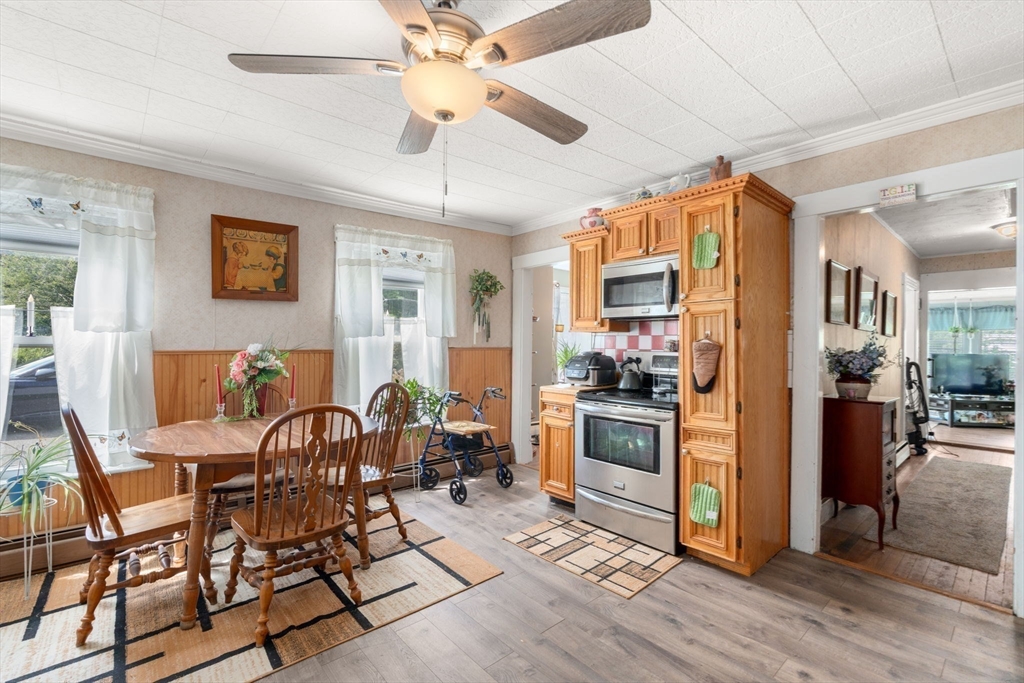 130 Tower Road Lincoln, MA 01773 - Photo 6 of 21 a view of a dining room with furniture window and wooden floor