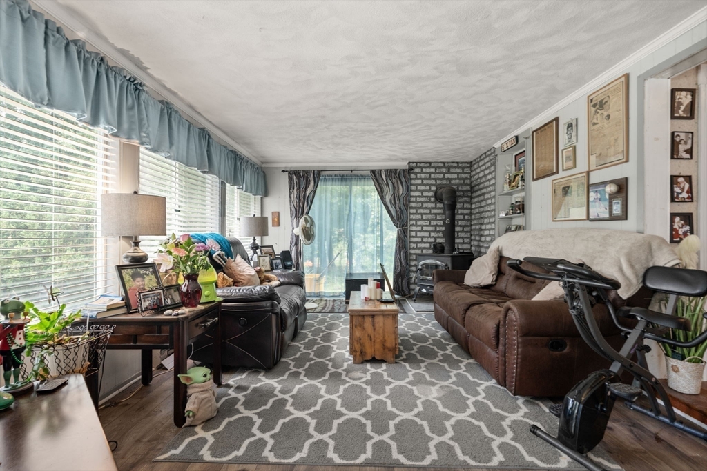 130 Tower Road Lincoln, MA 01773 - Photo 9 of 21 a living room with furniture and a window