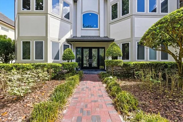 a bathroom with a sink and a large mirror