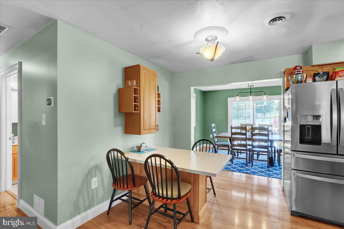 41 Michelle Way Hanover, PA 17331 - Photo 6 of 49 a view of a dining room with furniture window and wooden floor