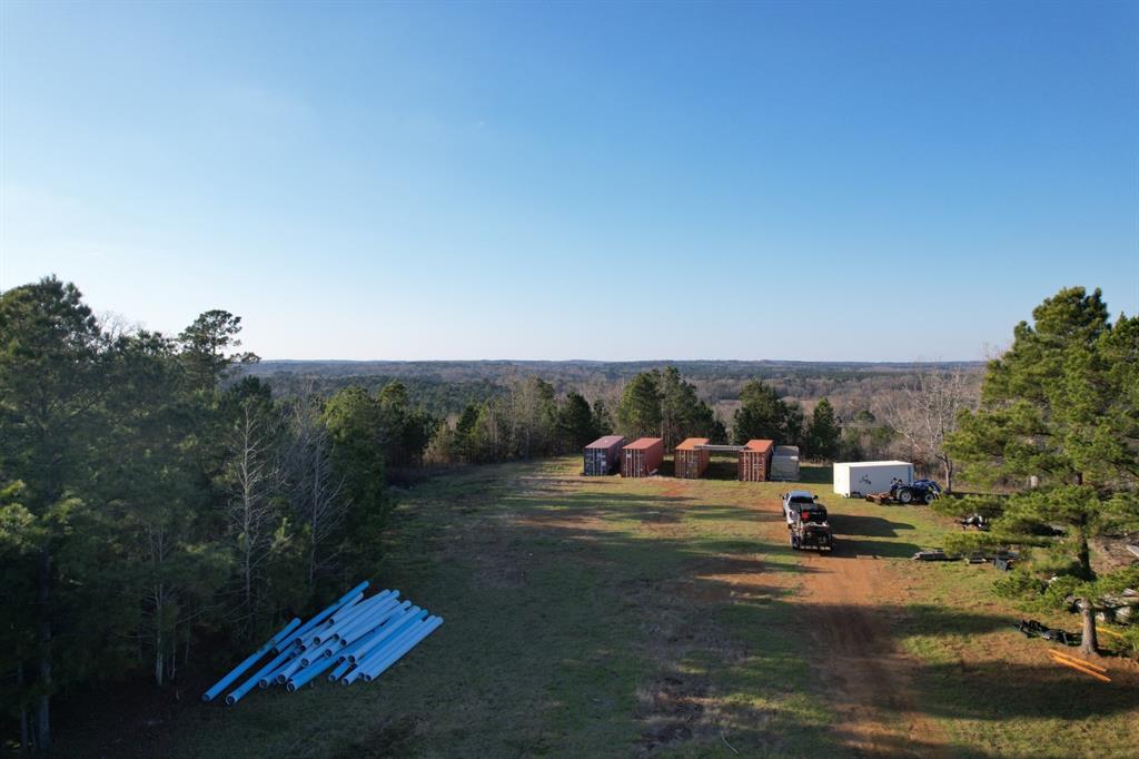 Tbd Tbd Reeves Road Garrison, TX 75946 - Photo 9 of 13 a car parked on the side of the road