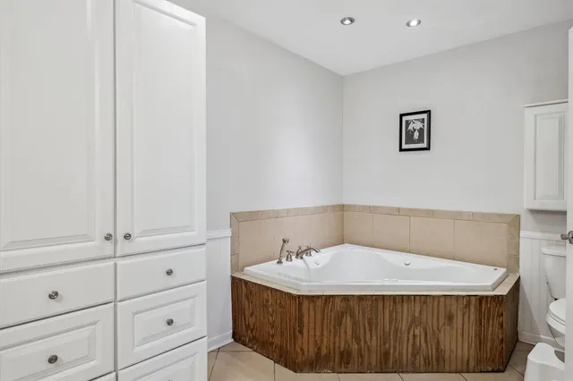 a view of a livingroom with furniture window and wooden floor