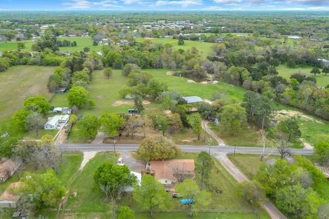 a view of a lake with a yard