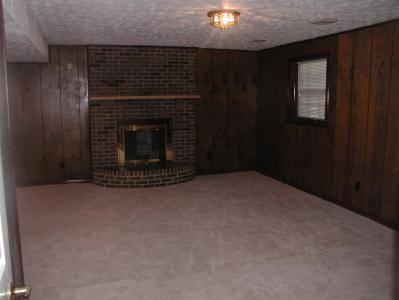 3221 Montavesta Road Lexington, KY 40502 - Photo 2 of 10 BASEMENT FAMILY ROOM WITH BRICK FIREPLA