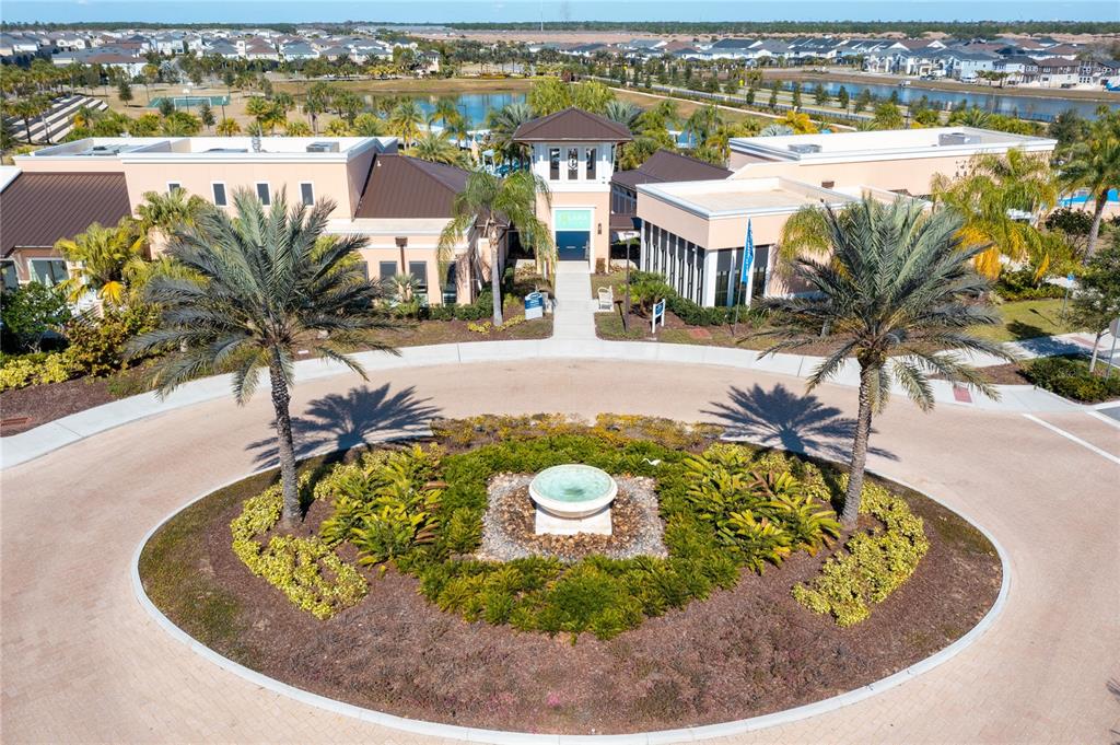 8900 Caroline Bay Court Kissimmee, FL 34747 - Photo 59 of 62 a view of a swimming pool with outdoor seating and plants
