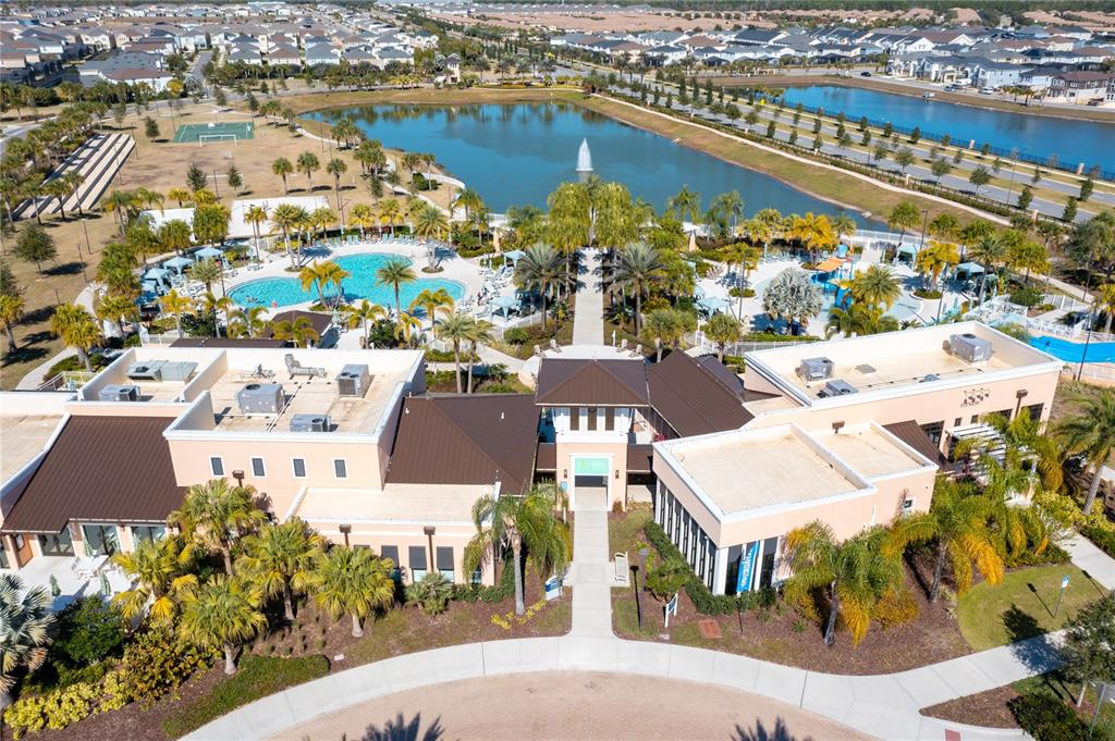 8900 Caroline Bay Court Kissimmee, FL 34747 - Photo 60 of 62 an aerial view of residential building and lake view